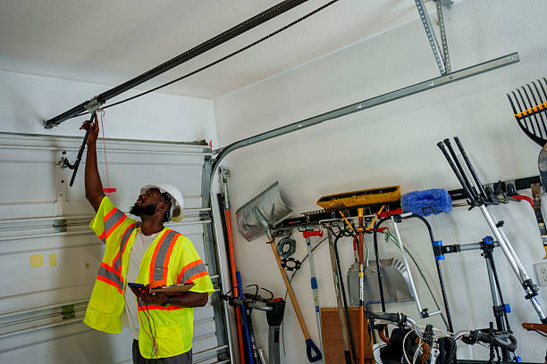 Professional Garage Door Panel Replacement technician working in Brundidge, AL